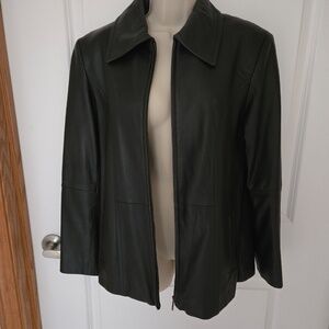 Womens size M 100% genuine leather jacket.